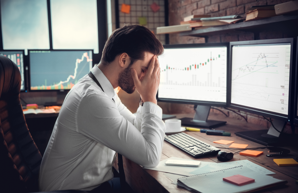 Six-figure loss devastates a businessman at his computer